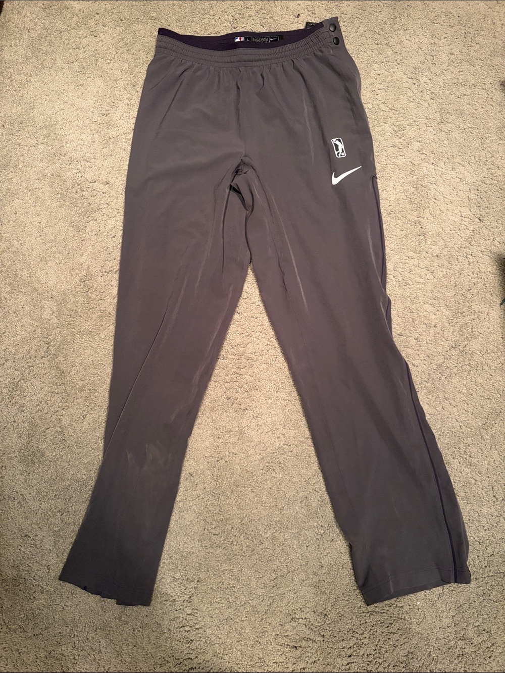 Nike Men’s Dark Gray Milwaukee Bucks Snap Pants with White Swoosh and NBA Patch